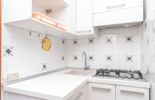Punta Sardegna Apartment | Quiet Holiday Apartment with Terrace with Sea View; Parking Available; Pets Allowed