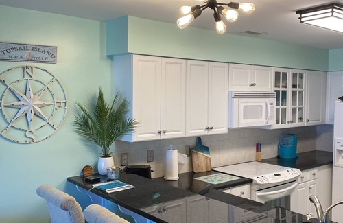 Surf City House | Quiet Island Hideaway with private beach access/pool, near shops and food.