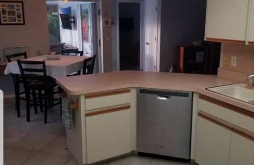 Englewood East House | Quiet neighborhood close to amenities/6 miles from beach with private pool