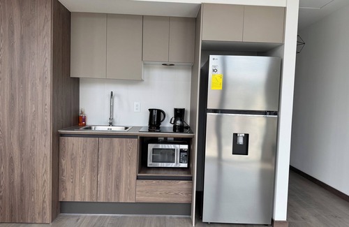 La Carolina Apartment | Quito Sky High: 15th Floor Studio with Stunning Views & Amenities/Parking