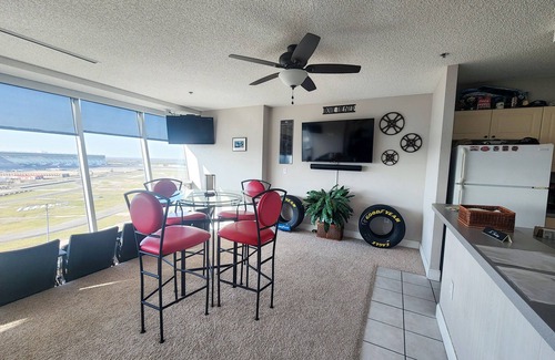 Denton County Condo | Race-Themed Luxury 7th Floor Texas Motor Speedway Condo - Right on the track!