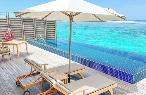 Huruelhi Island Resort | Radisson Blu Resort Maldives with 50 % off on Sea Plane round trip 03 nights & above