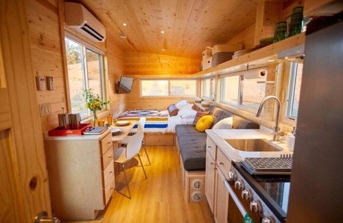 Arroyo Hondo House | Rainbow Tiny Home w Mountain View, Hot Tub, and Hot Springs just 2 miles away.