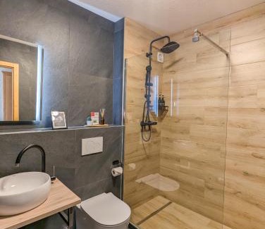 Villars-sur-Ollon Apartment | Rare, quite & centered Apartment with Garden & Fireplace