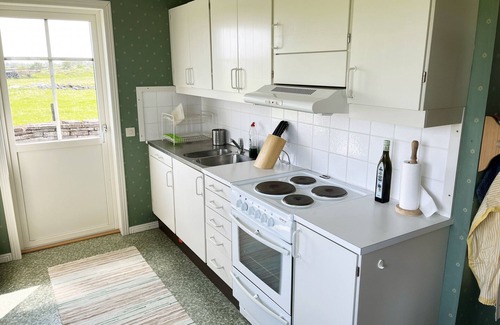Alby House | Red cozy cottage with sea view | SE04035