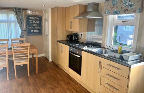 Stepps Resort | Red Deer Village Holiday Park - 2 Bedroom, Self-Catering Chalet