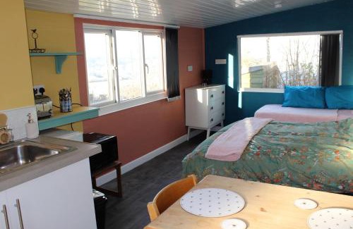 Corwen Ski Chalet | Redwood Lodge, Dee Valley Stays - cosy microlodge with detached private shower & WC