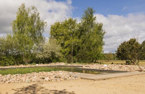 Krienke House | Reetdachhaus Kranich mit Schwimmteich in Krienke