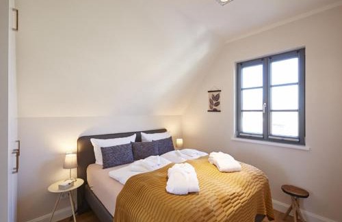 Kreptitz House | Reetland am Meer - Premium Reetdachvilla mit 3 Schlafzimmern, Sauna und Kamin E16