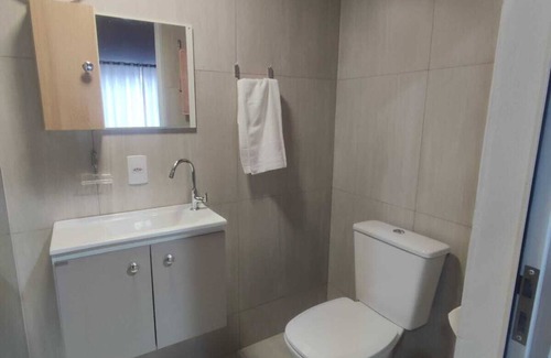 Centro Apartment | Refuge on the beach of Navegantes/SC, 200m from the central beach with comfort and security.