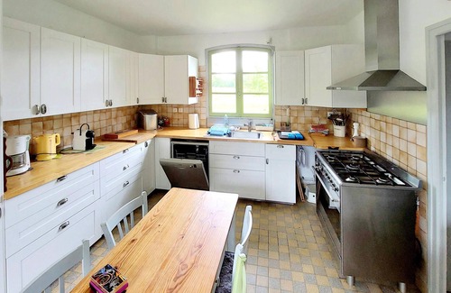 La Ferte-Saint-Aubin House | Relax in this historic and characterful holiday home with shared pool.