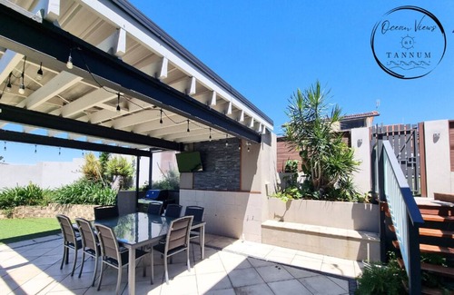 Tannum Sands House | Relaxing family beach house with pool! Soak up the ocean views and breezes.