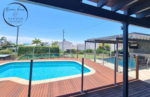 Tannum Sands House | Relaxing family beach house with pool! Soak up the ocean views and breezes.