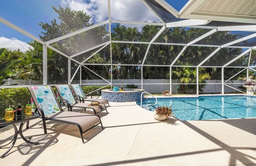 Pelican House | Relaxing outdoor with pool and hot tub!