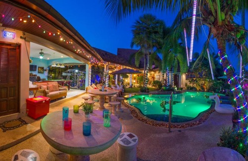 Nong Pla Lai Villa | Relaxing Palm Pool Villa, & Tropical Illuminated Garden & Private Swimming Pool.