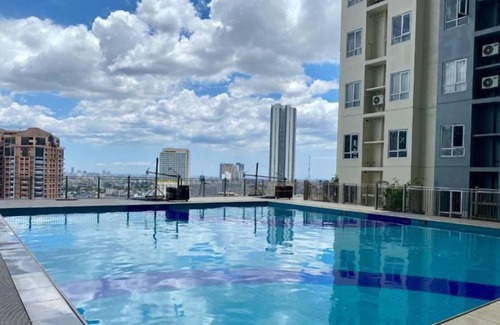South Triangle Condo | Relaxing Urban Escape with Swimming Pool