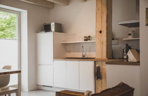 Upleward Apartment | "Relaxing vacation at the historic Gulfhof Boomgaarden on the North Sea!"