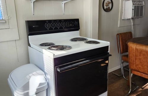 Spruce Cottage | Remodeled cozy cottage & only a 5 minute walk to Hubbard Lake. Lots of parking!