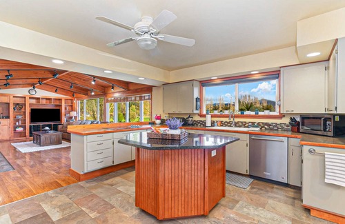 Enumclaw House | Remodeled home with private heated indoor pool, deck, hot tub, fireplace, grill