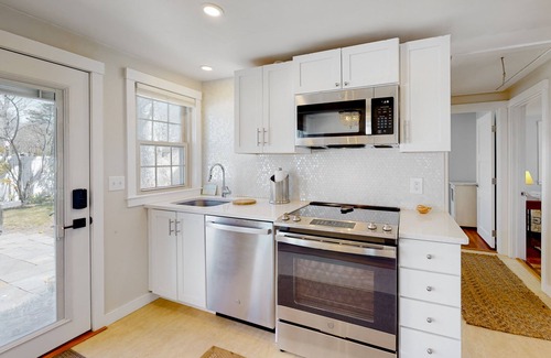 Cataumet House | Renovated cottage steps from private beach with backyard, grill, bay views, AC