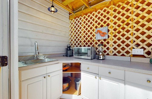 Cataumet House | Renovated cottage steps from private beach with backyard, grill, bay views, AC