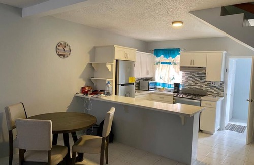 Lucea Apartment | Renovated family-sized home, just a few short minutes from the beach!