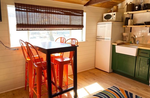 Camdenton Cabin | Renovated lakeside cabin with pool & resort amenities!