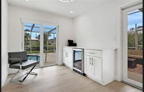 Lochmoor Waterway Estates House | Renovated Modern Home with Big Pool & Ocean Access