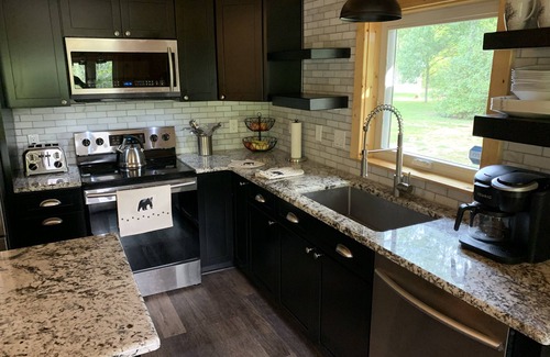 Thompsonville Cabin | Renovated River House on the Betsie in Northern Michigan