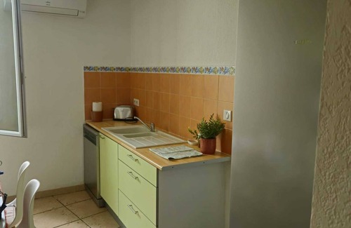 Pomerols Apartment | Renovated village house apartment with garage 10 minutes from the beach!