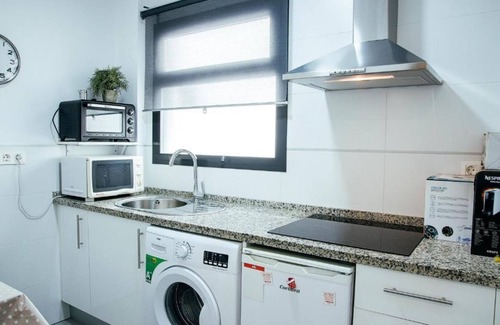 Los Remedios Apartment | RentalSevilla Walking through the Remedies