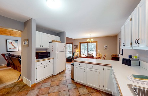 Thompsonville House | Resort home with private indoor hot tub, game room, firepit, bikes, Ping-Pong