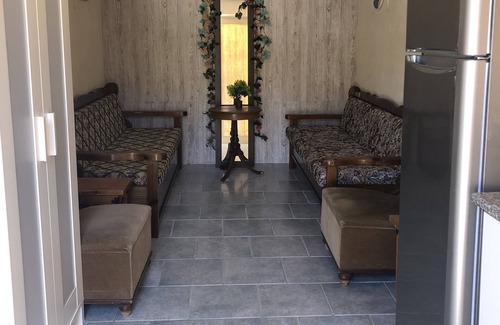 Markopoulo Mesogaias Apartment | Resort town converted studio with patio garden