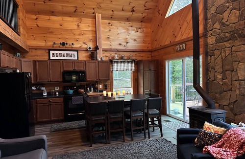 Stark Cabin | Ride right from this trailside cozy cabin in the woods with private pond.