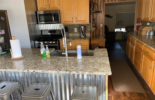 Navajo Dam House | River front fishing house close to Quality Waters and Navajo State Park