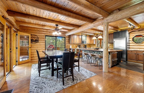 Whispering Pines Cabin | Riverfront Cabin with Hot Tub, Games & Wild Blackberry Trails