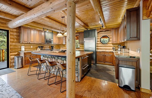 Whispering Pines Cabin | Riverfront Cabin with Hot Tub, Games & Wild Blackberry Trails