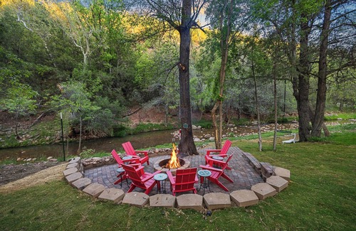 Whispering Pines Cabin | Riverfront Cabin with Hot Tub, Games & Wild Blackberry Trails