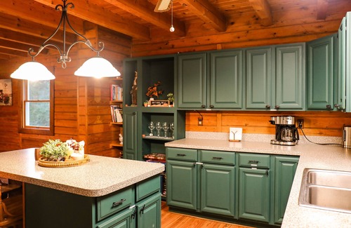 Fishers Hill Cabin | Riverfront logcabin; EVcharging, hot tub, firepit, Petfriendly Canoes, Sleeps 12