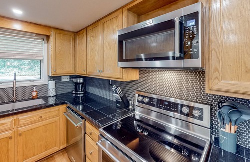 East Ellijay House | Riverfront townhome with two decks, fireplace, gazebo & woodland views