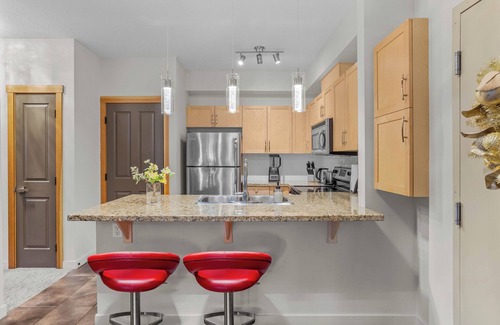 Cougar Creek Condo | Rockies View Soak- hot tub, pool, free parking, view, 3BR, sleeps 10 -TL