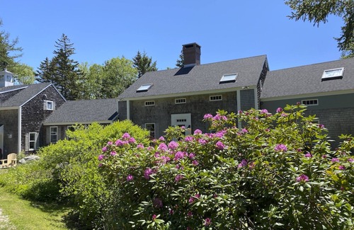 Saint George House | Rocky Bay is a waterfront home with dock, float & beach and sleeps 12.