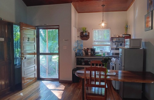 La Democracia Cottage | Romantic cottage with King bed, AC, Restaurant & car rental available.