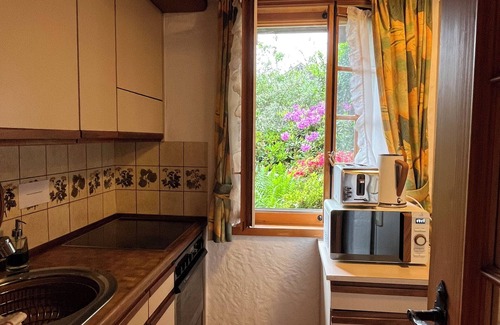 Unterseen Cottage | Romantic oasis with fireplace near mountains