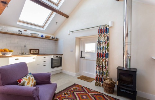 Witney Apartment | Romantic, quirky farm loft conversion with beautiful natural swimming pool