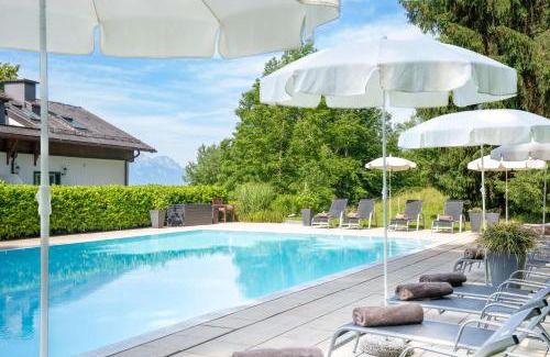 Laakirchen Hotel | Romantik Hotel Die Gersberg Alm über Salzburg mit Outdoorpool