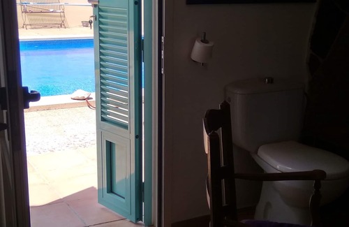 Felanitx House | Room for 2 people with swimming pool access, outdoor shower, peace and nature guaranteed.