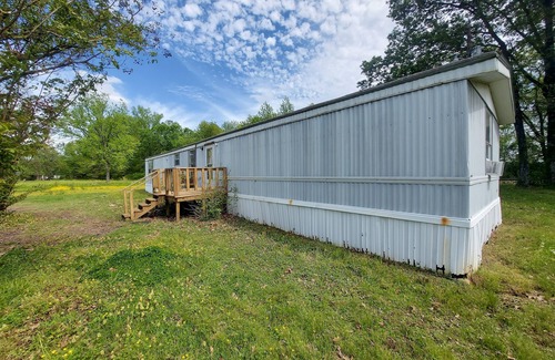 Stanton House | Room in mobile home with WiFi, AC, free washer & dryer. 5 miles from Blue Oval