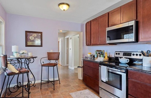 Springfield House | Room to Bloom, Upscale Home - Laundry Garage Yard