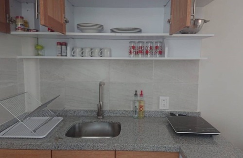 Coyoacan Apartment | Room with a bed, sofa bed, kitchenette and bathroom.